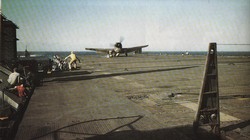 An F-64F Hellcat makes a hard landing on the USS Cowpens during operations in the Gilbert Islands in November 1943.