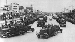 German troops parade through Bucharest during October 1940.