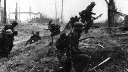 A machine-gun team moves forward through the suburbs of Stalingrad.