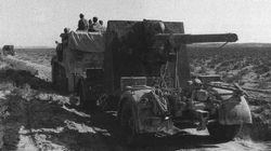 A German towed 88mm anti-aircraft gun moves forward in July 1942.